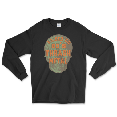 A black long-sleeve shirt features a bold graphic of a skull with the text "Raised on 80's Thrash Metal" in large orange letters. The design is centered on the chest area, giving a vintage and rugged look suitable for fans of thrash metal music from the 1980s. By Left Arrow Tees company.