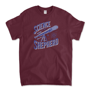 Maroon red T-shirt featuring an atheist-themed design with the phrase 'Science is My Shepherd' in bold, vintage-style typography. The graphic includes a telescope pointing upward, surrounded by stars and an atom symbol, emphasizing a secular, science-centered worldview. Affordable graphic t-shirts from Left Arrow Tees.
