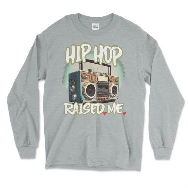 Sport Grey long sleeve shirt featuring the bold phrase 'Hip Hop Raised Me' with a vibrant retro boombox graphic, celebrating the golden era of 80s and 90s hip hop culture. Perfect for music lovers and nostalgia enthusiasts, this shirt is a stylish nod to the roots of hip hop. Left Arrow Tees offers this and more affordable graphic tees designed to help you wear your passions proudly.