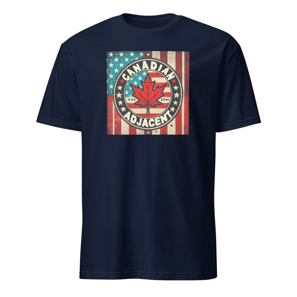 Navy T-shirt featuring a bold, vintage-style graphic design with the text 'Canadian Adjacent' encircling a maple leaf set against a backdrop of an American flag. The distressed look adds character, making it a fun and stylish choice for celebrating cross-border love and humor. Left Arrow Tees, affordable graphic tees.