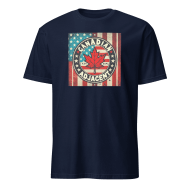 Navy T-shirt featuring a bold, vintage-style graphic design with the text 'Canadian Adjacent' encircling a maple leaf set against a backdrop of an American flag. The distressed look adds character, making it a fun and stylish choice for celebrating cross-border love and humor. Left Arrow Tees, affordable graphic tees.